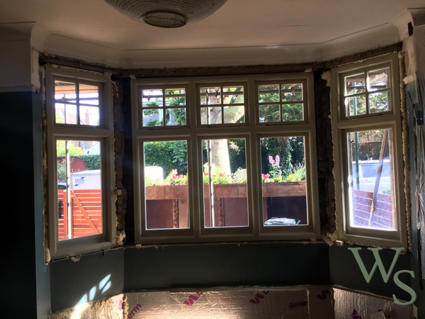 After Stage 1 of Expanding Foam Injection During Installation of Wooden Victorian Style Bay Window